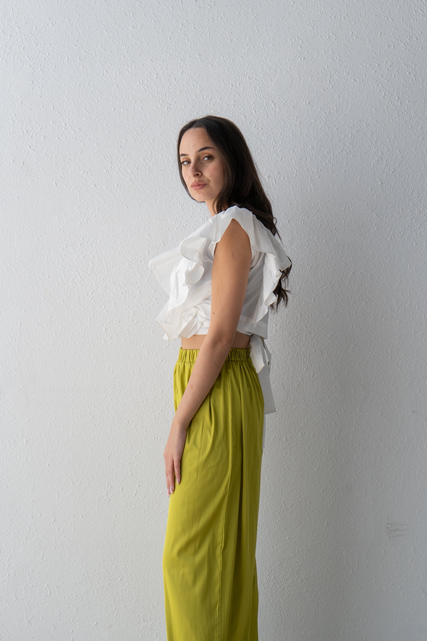 Wrap blouse with shoulder ruffle