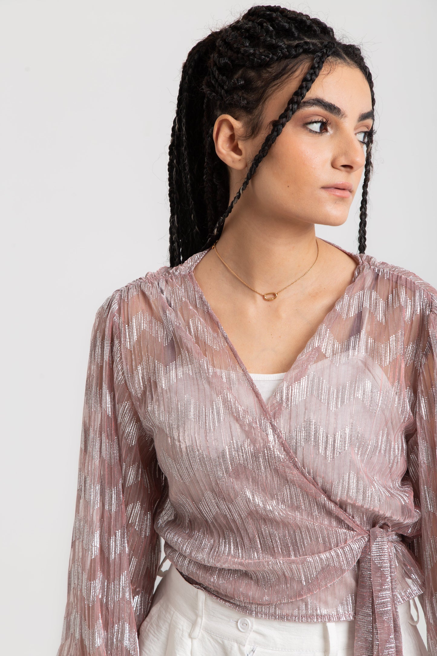 Wrap top in shinny pleated fabric