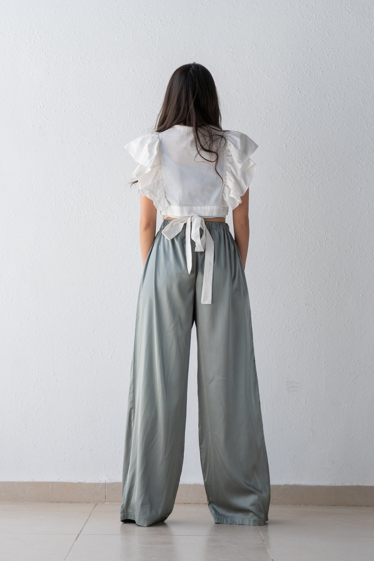 Wrap blouse with shoulder ruffle