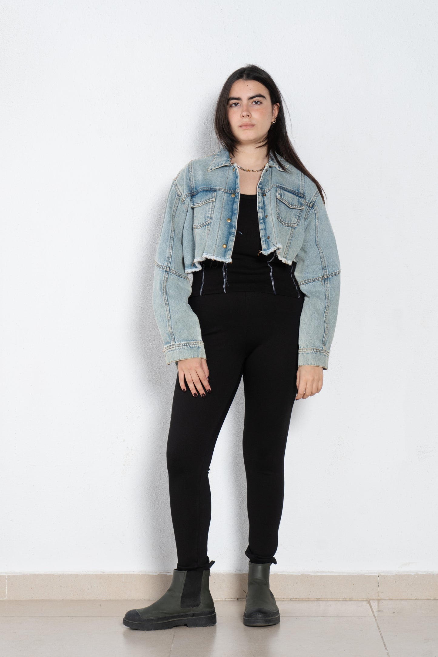 Cropped jeans jacket with cuts