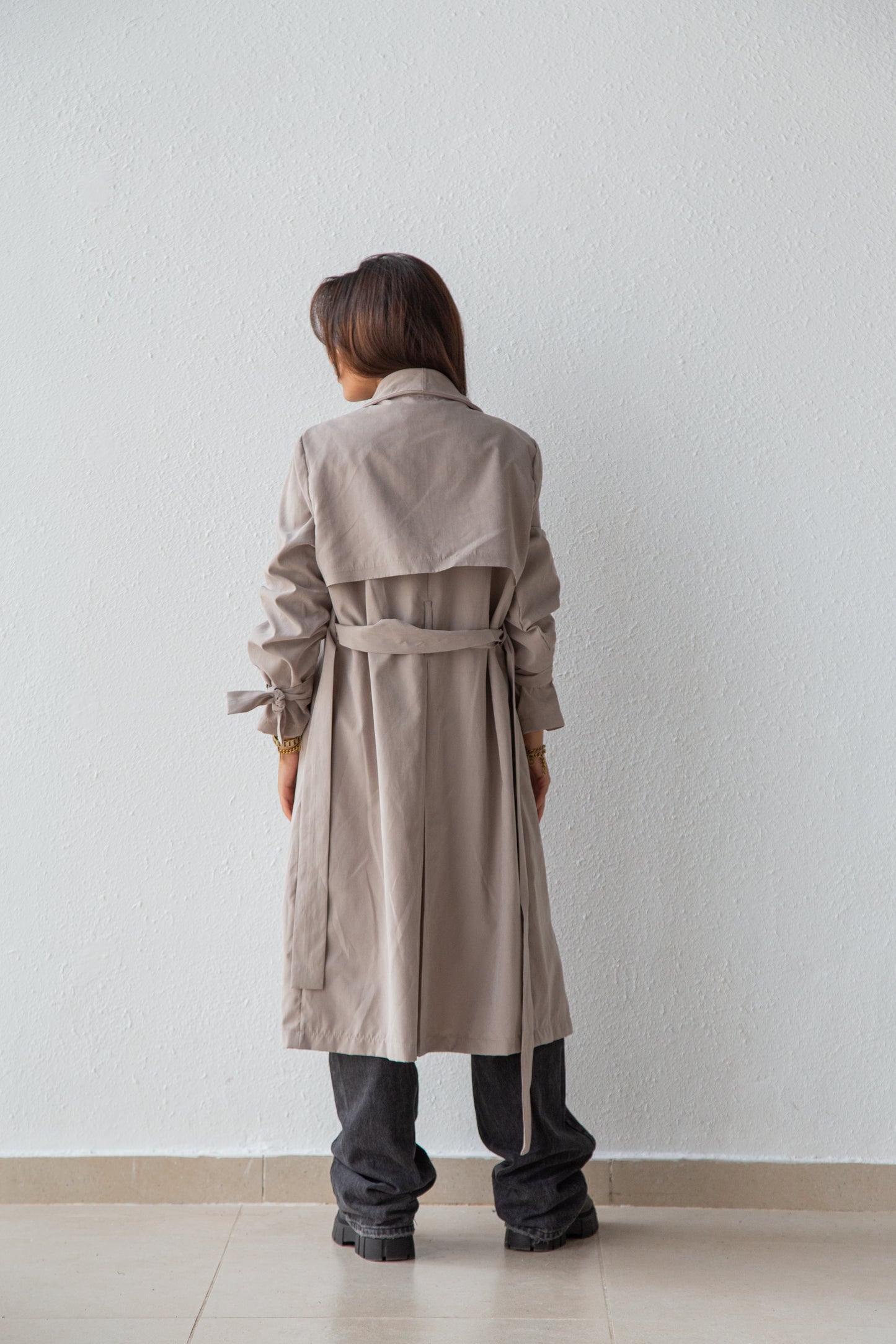 Trench coat with double buttons