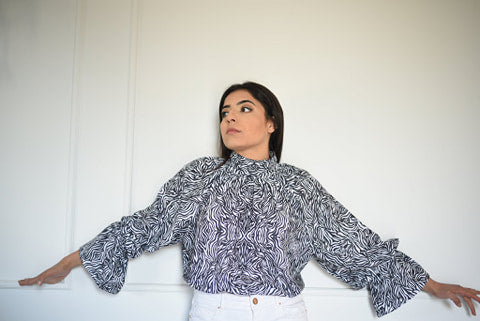 Animal printed blouse with turttle neck