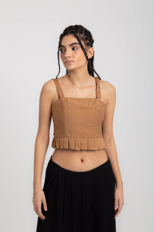 Top with ruffle detail on hemline