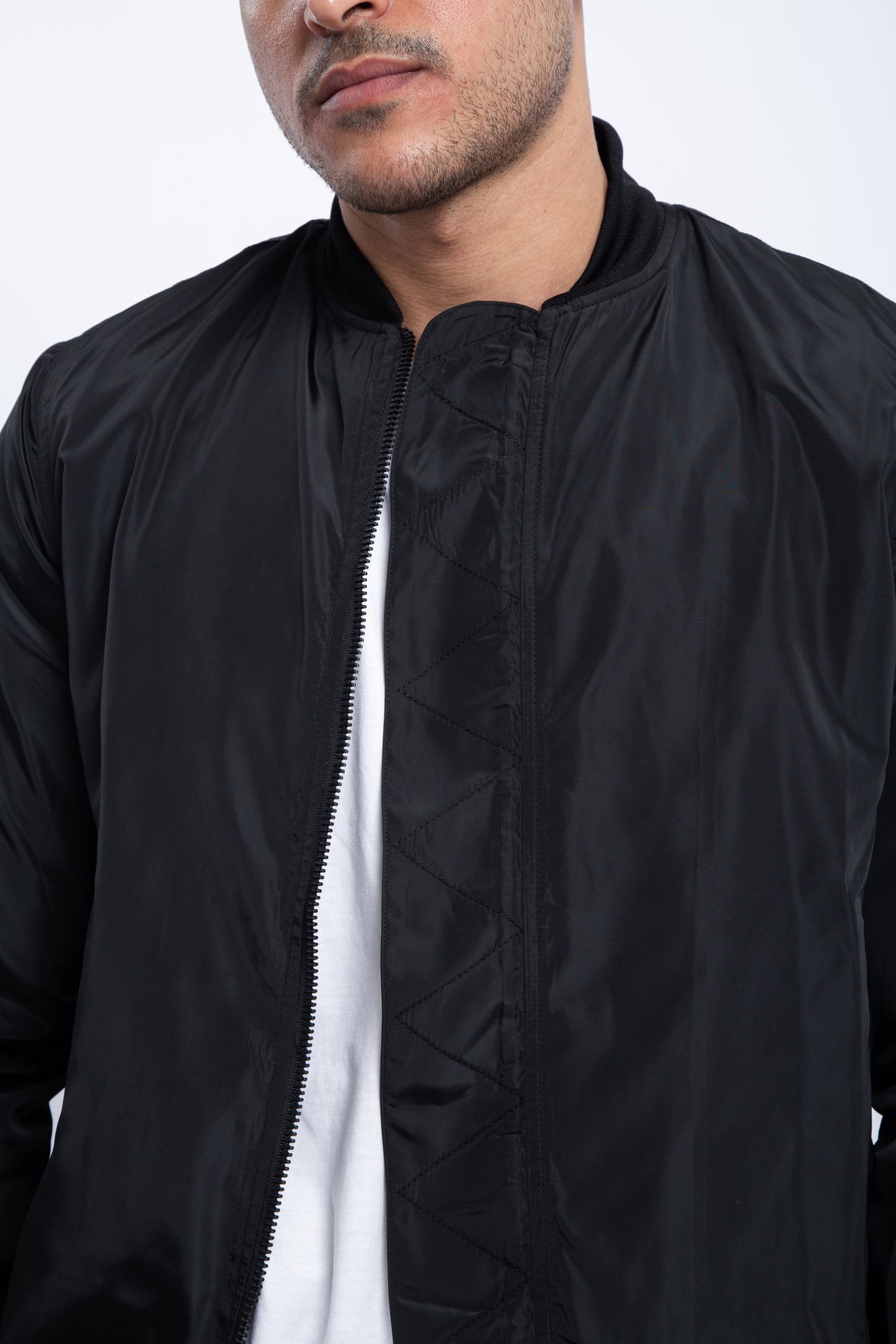 Bomber jacket with zigzag stitching