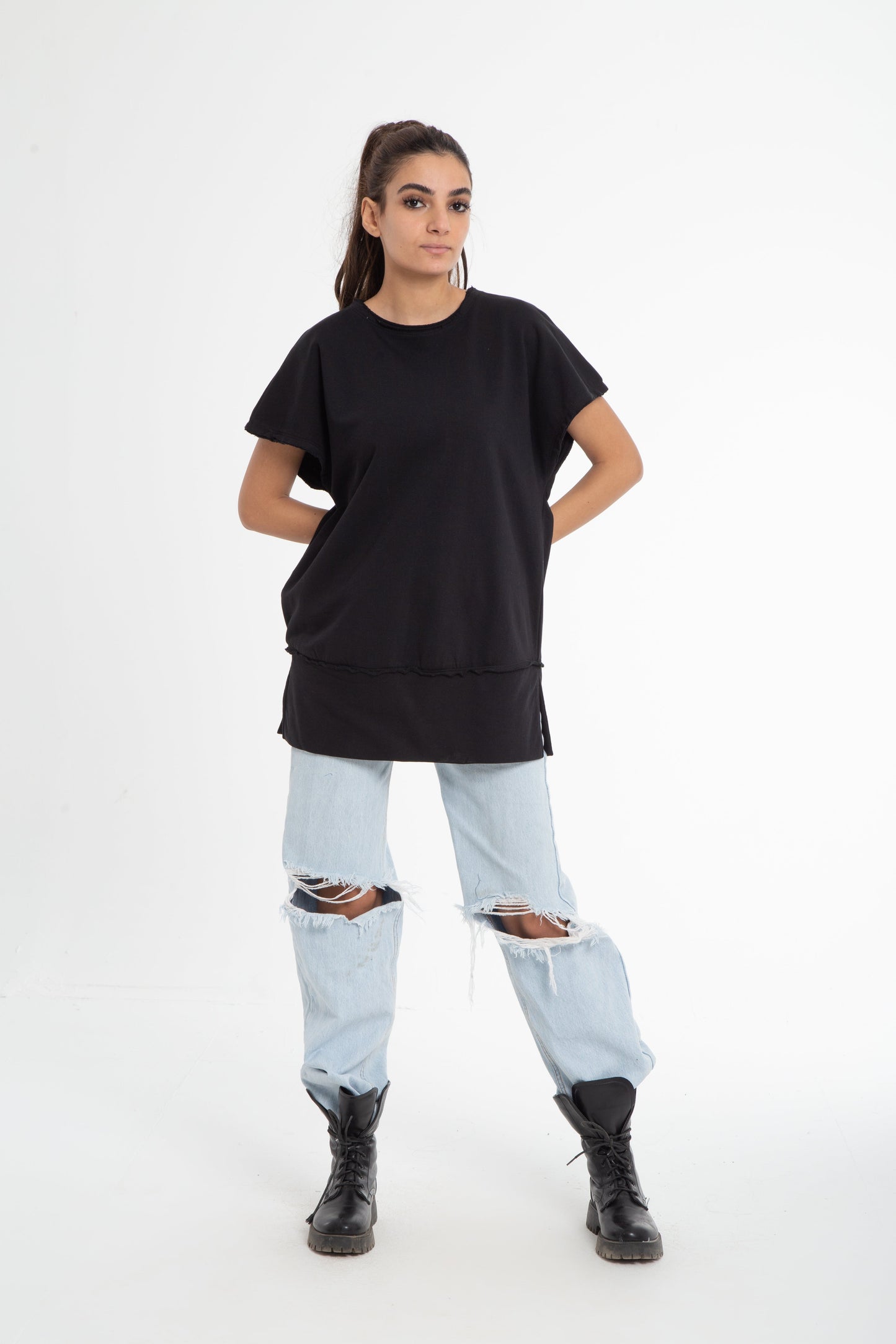 Wide shoulder blouse with raw edges