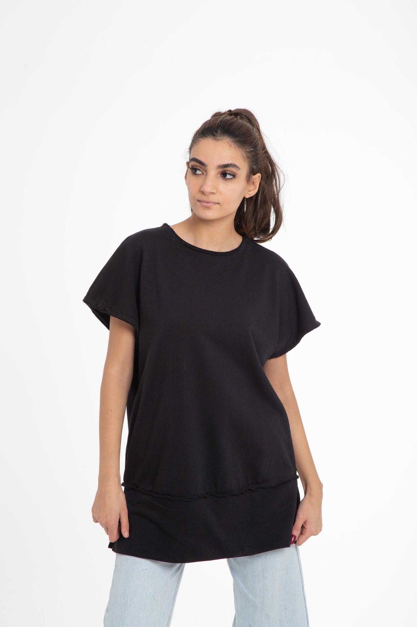 Wide shoulder blouse with raw edges